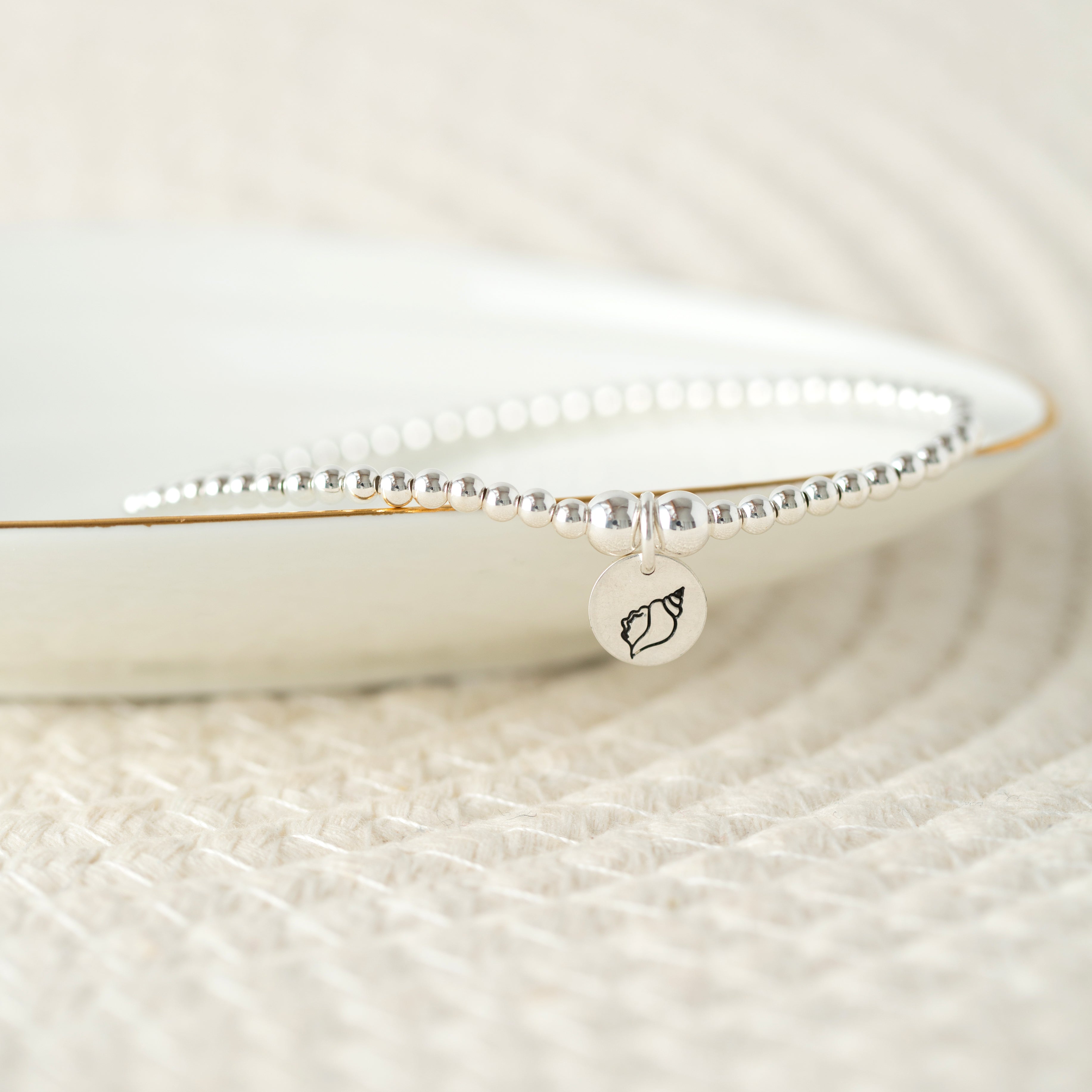 Mini silver disc beaded bracelet