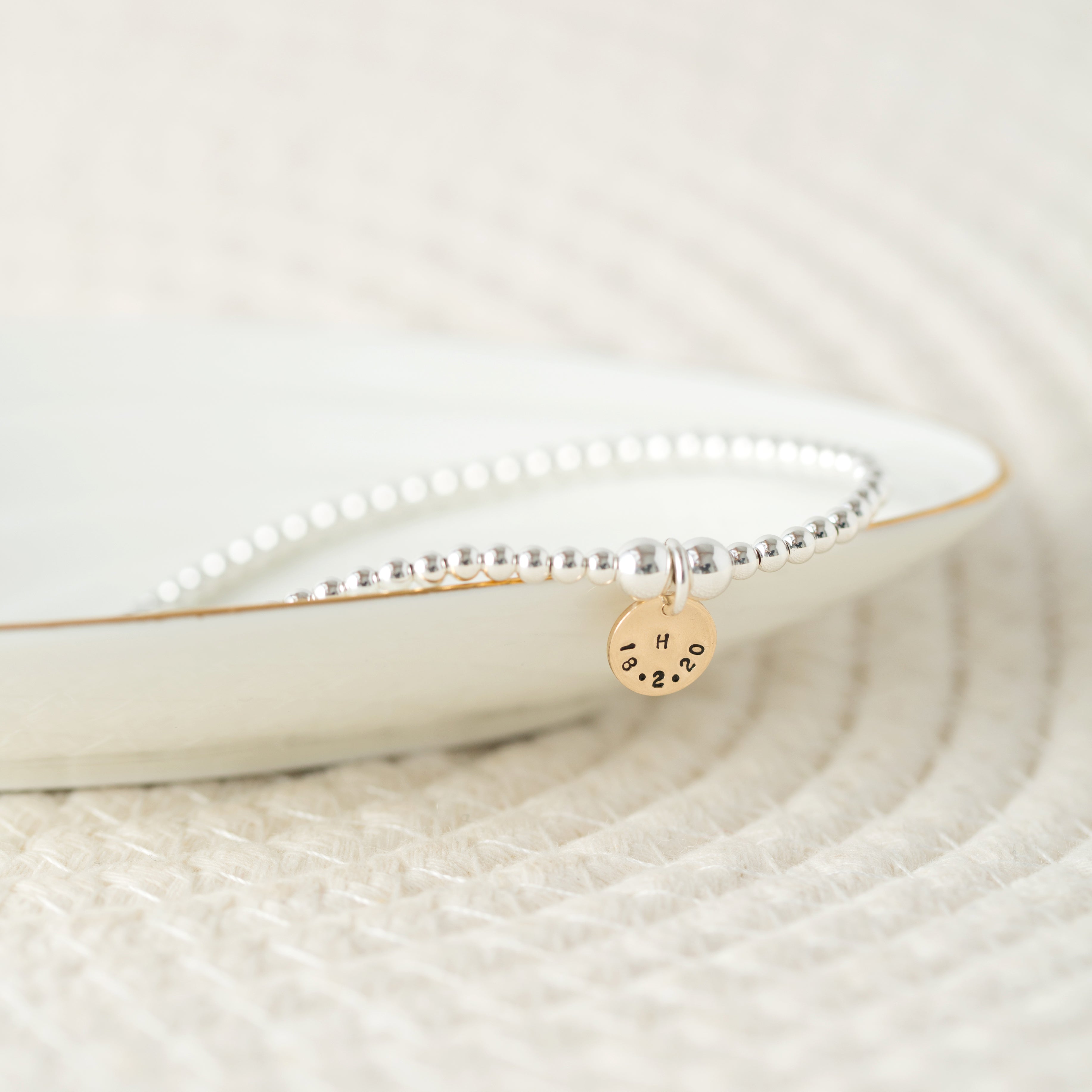 Gold mini disc beaded bracelet