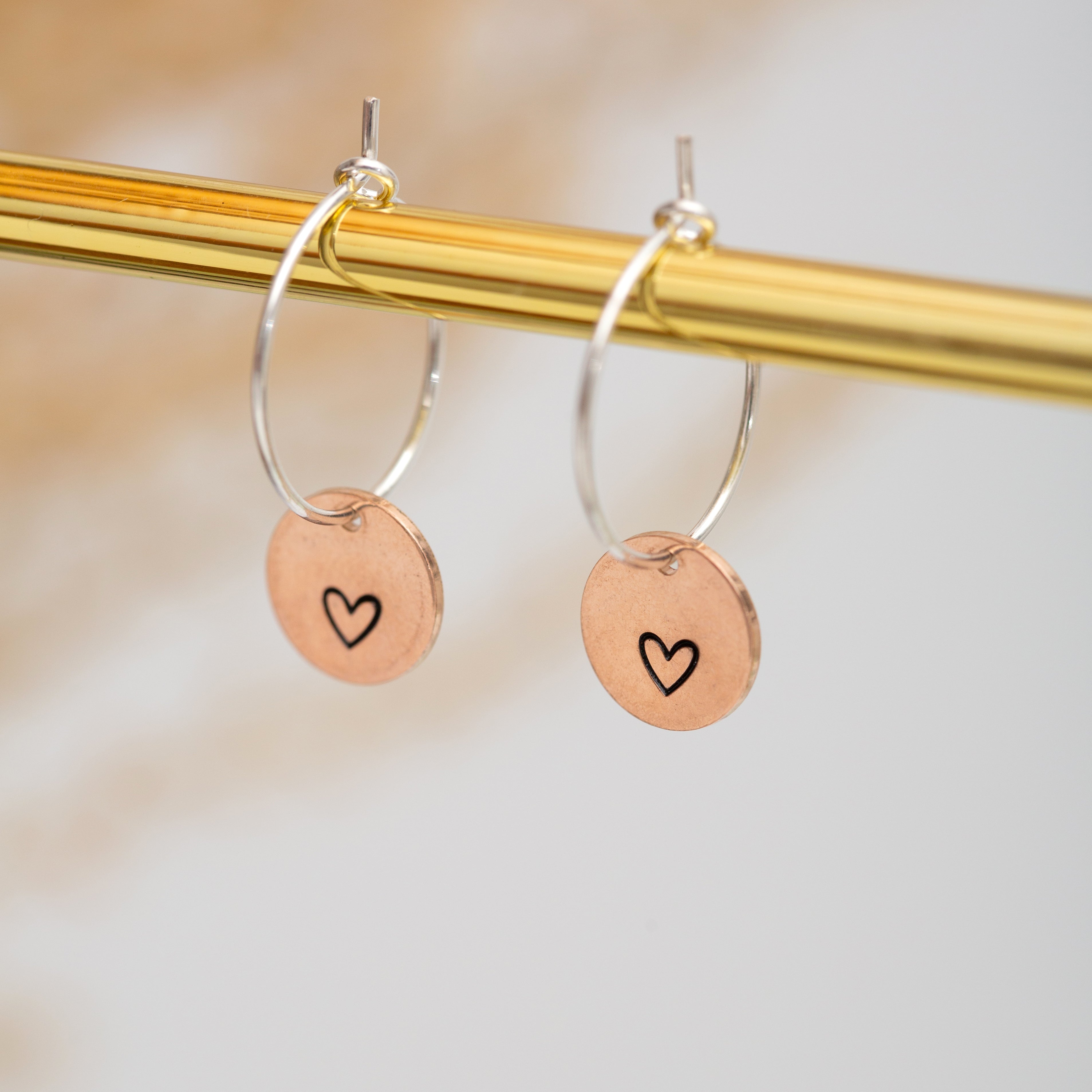 Rose gold disc hoop earrings