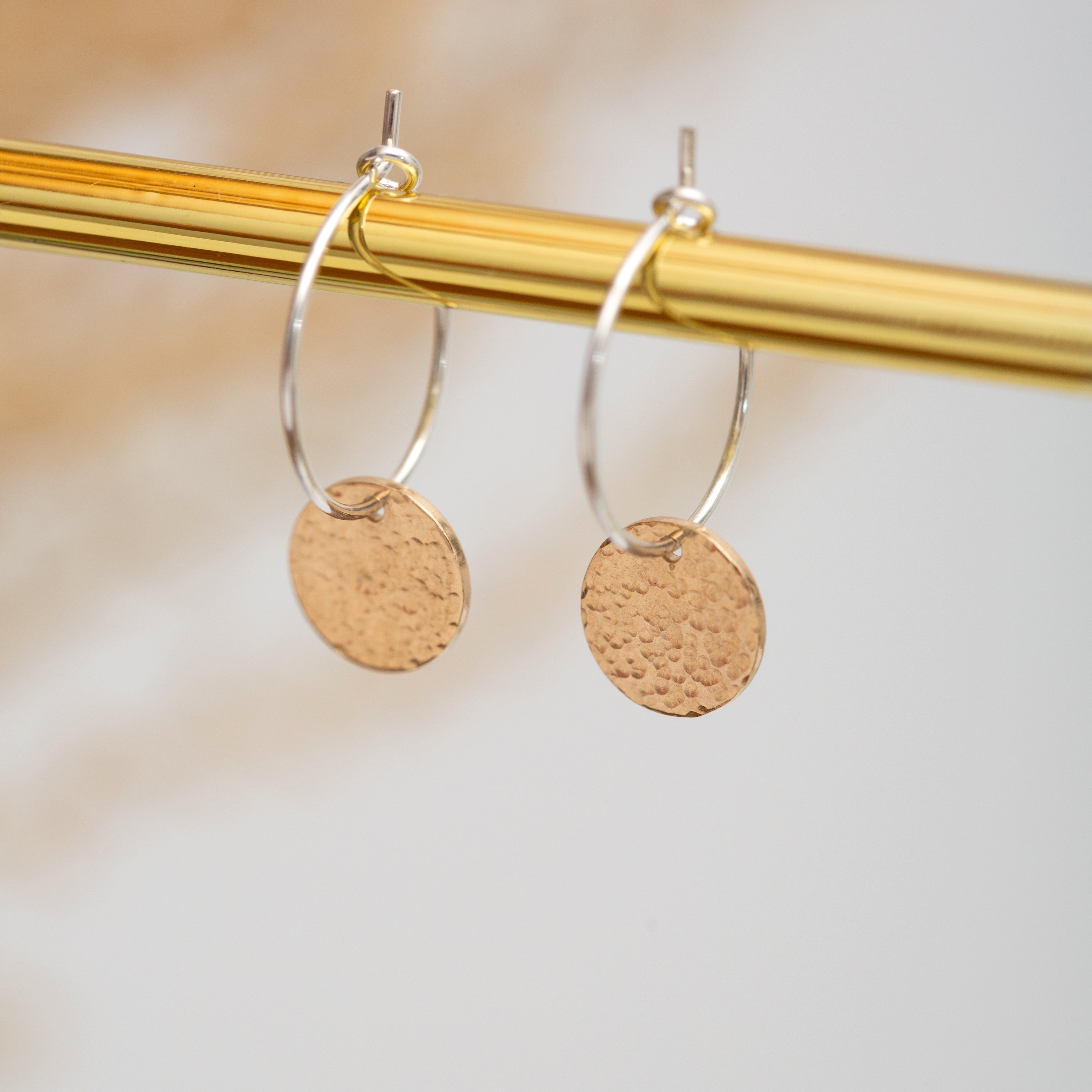 Hammered disc hoop earrings