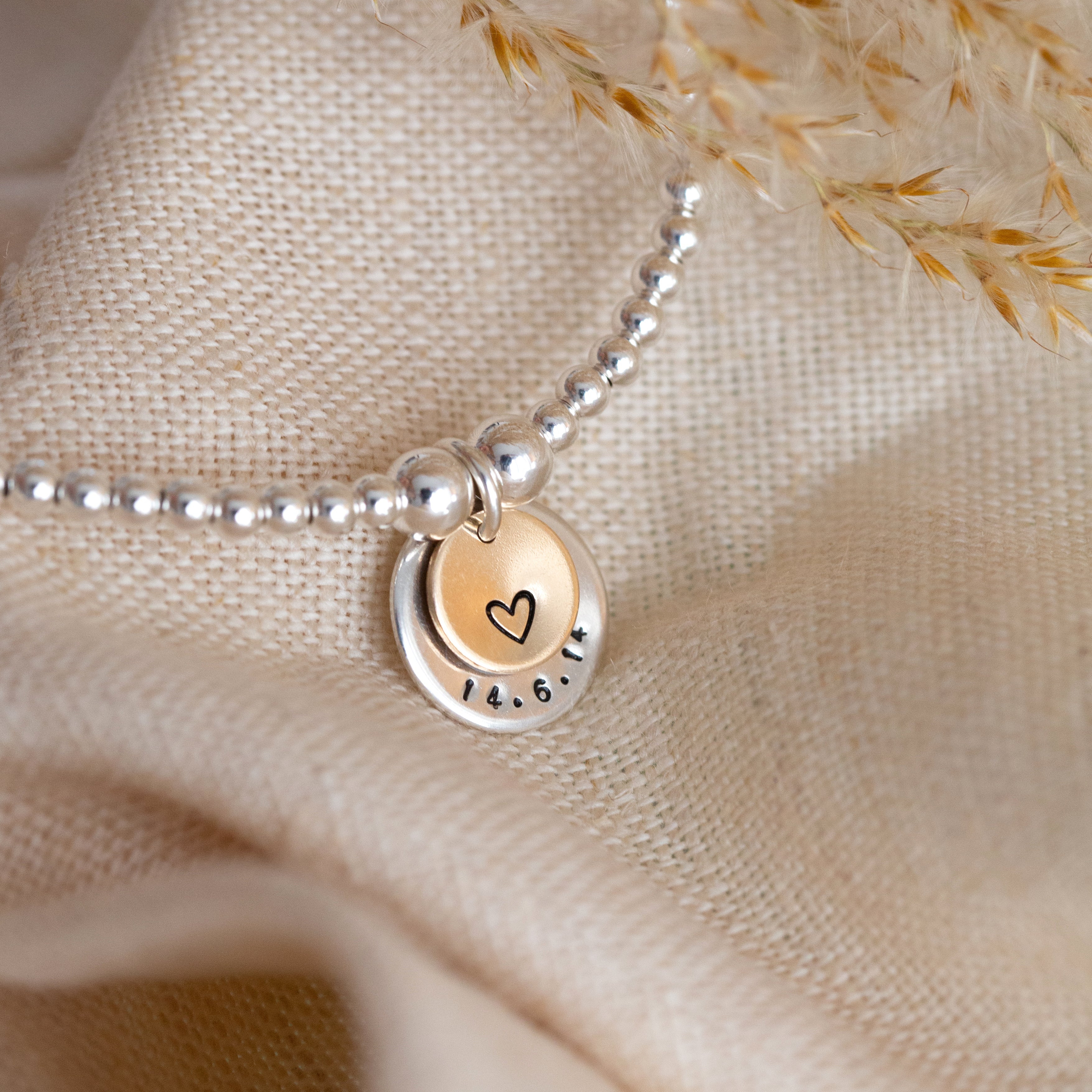 Layered disc beaded bracelet
