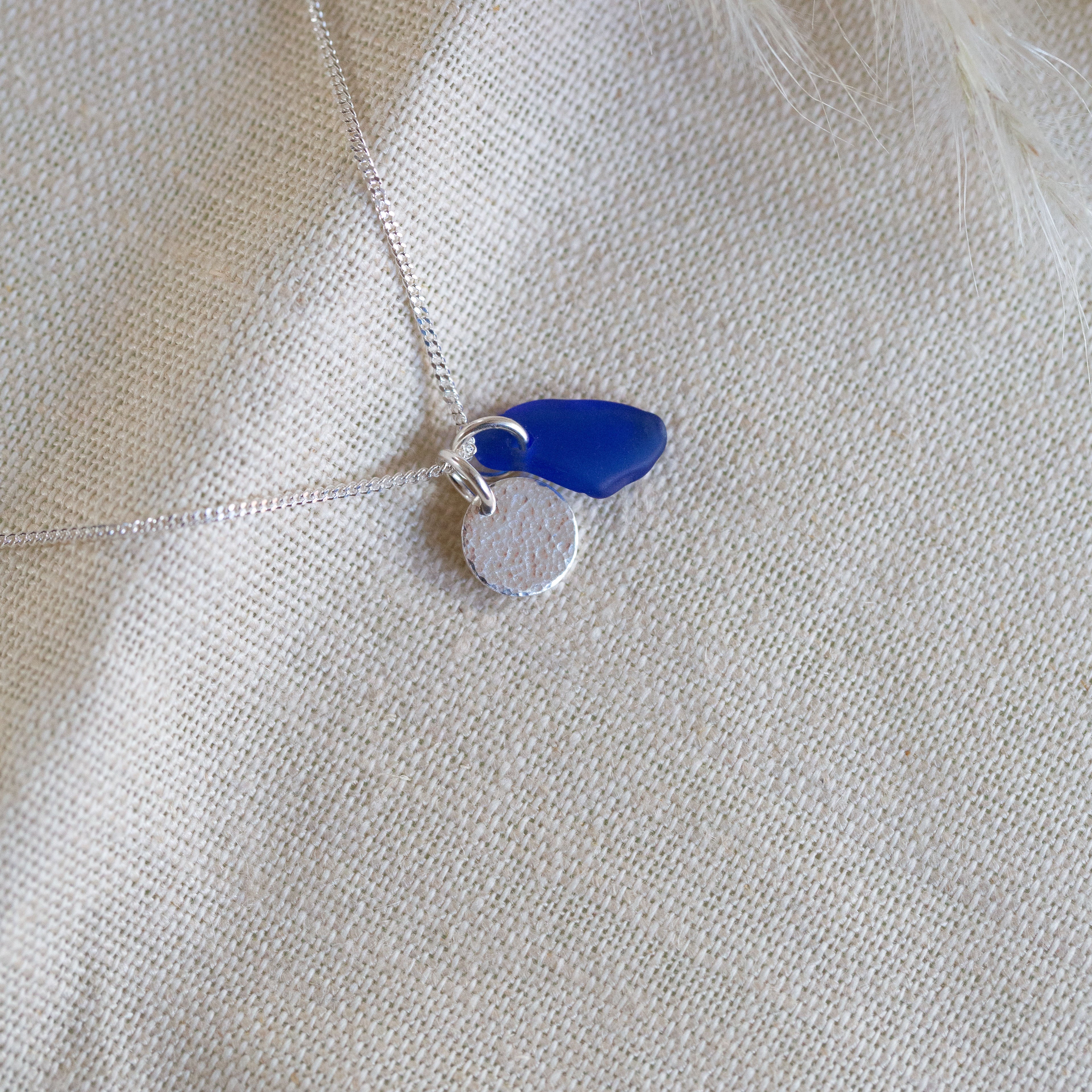 Sea glass & hammered charm