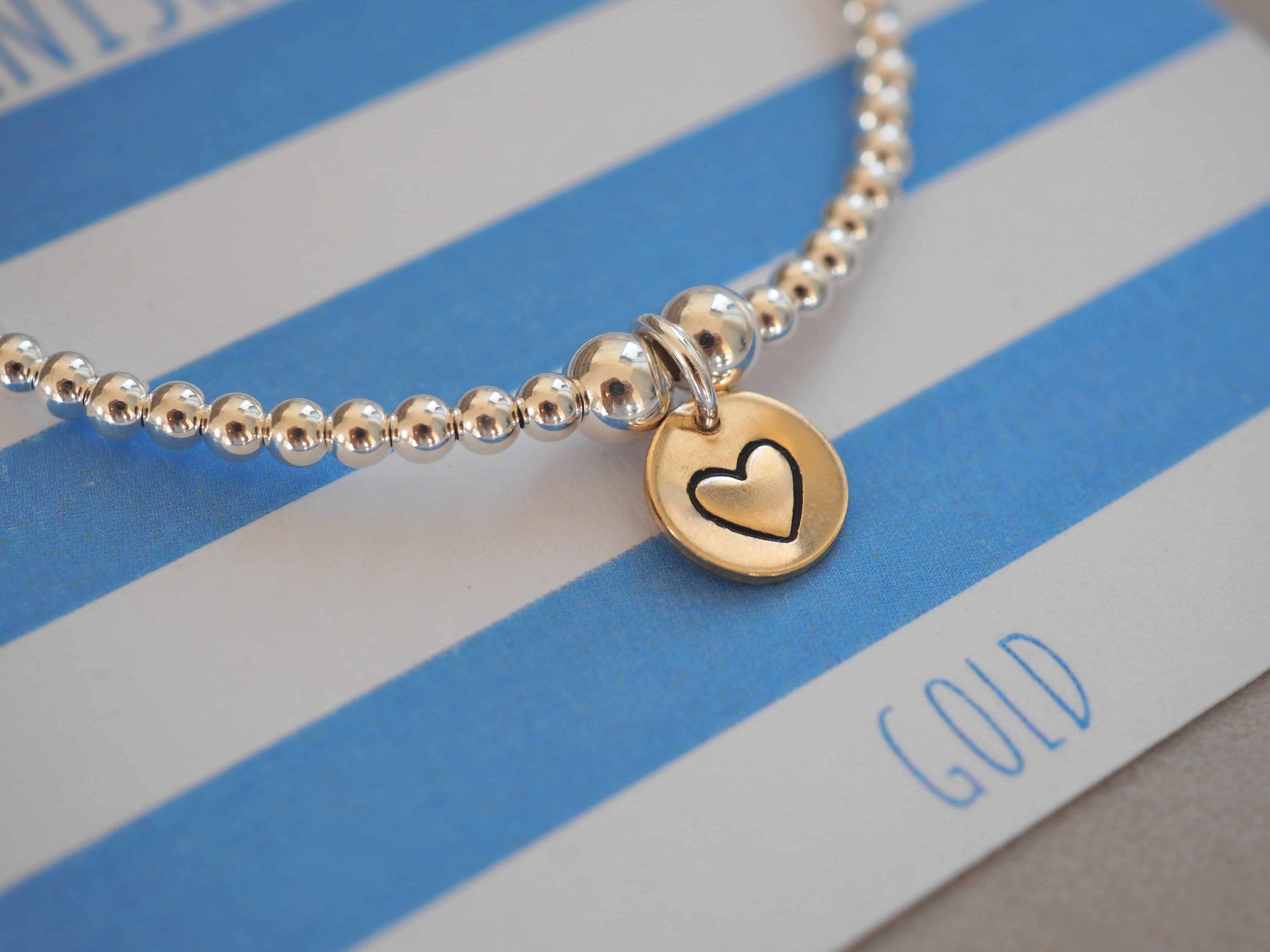 Gold mini disc beaded bracelet
