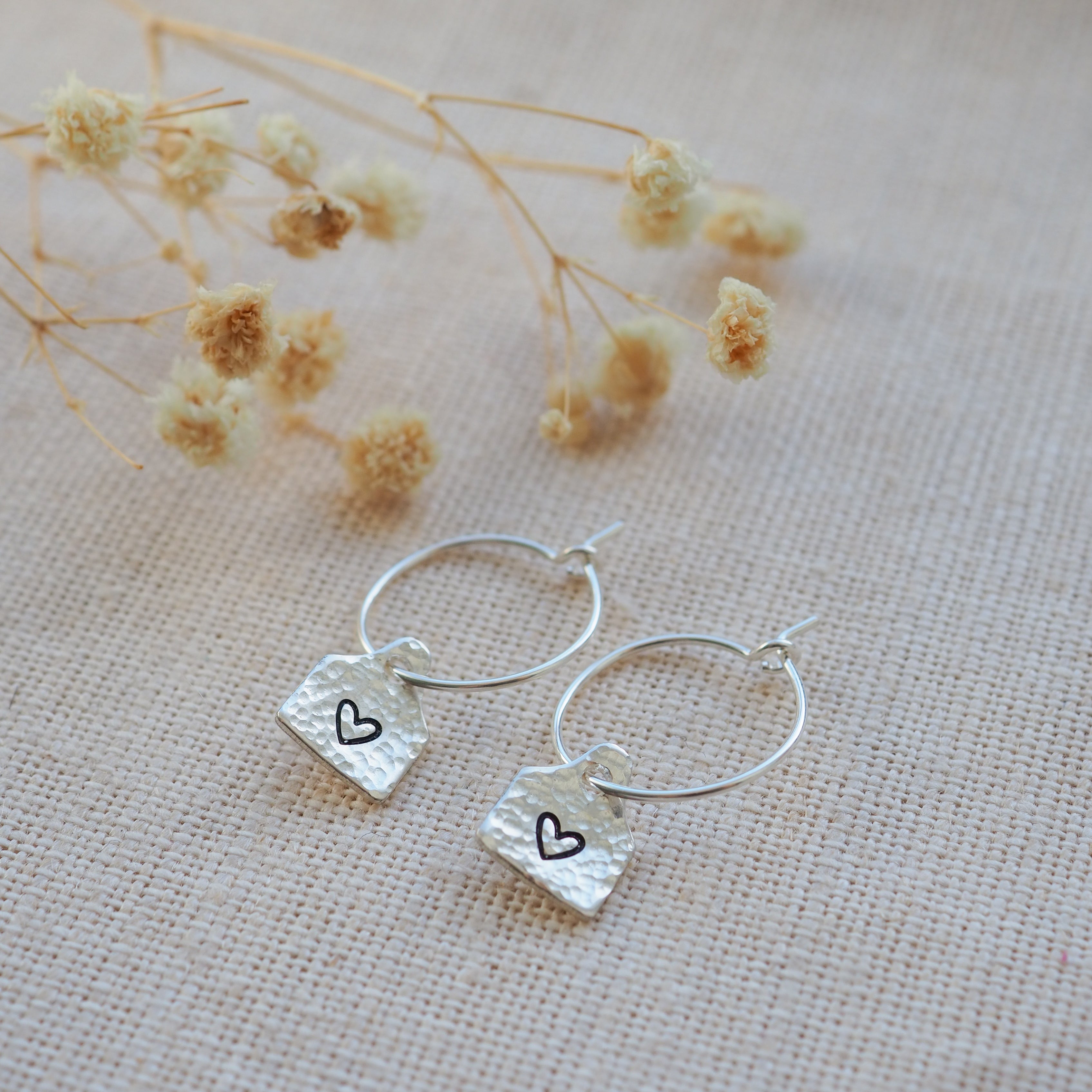 Ear tag hoop earrings