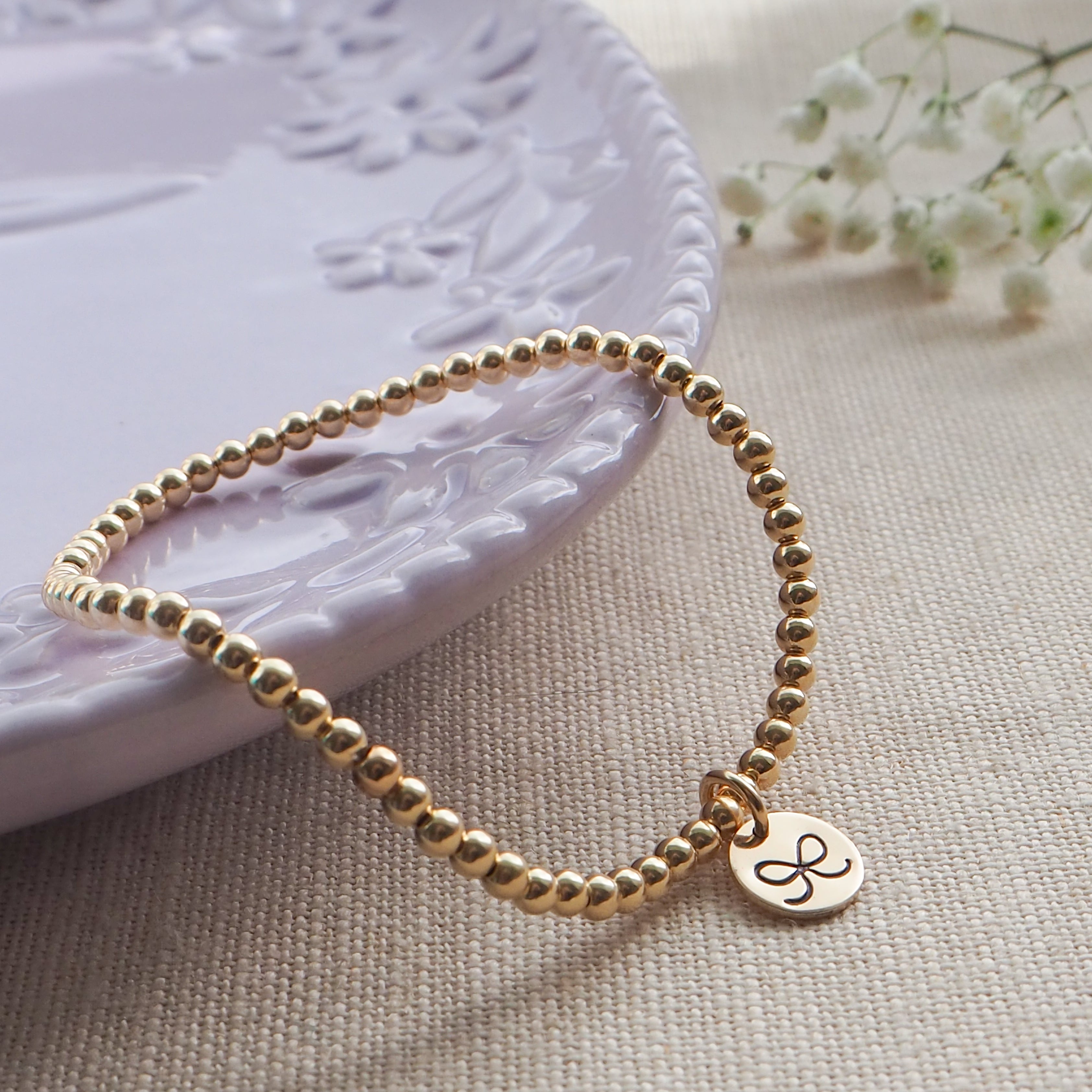 Gold Hand Stamped Bow Bracelet