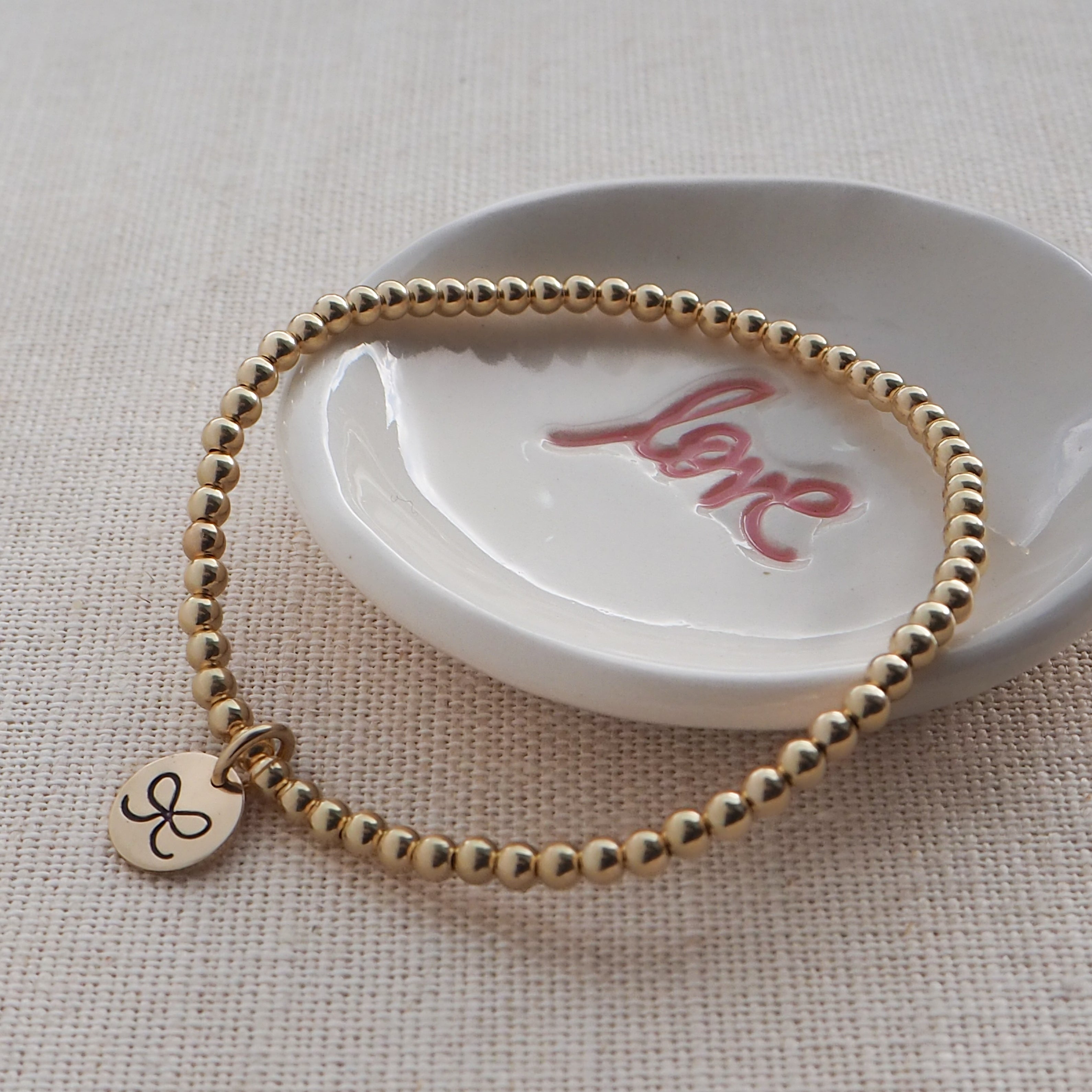 Gold Hand Stamped Bow Bracelet