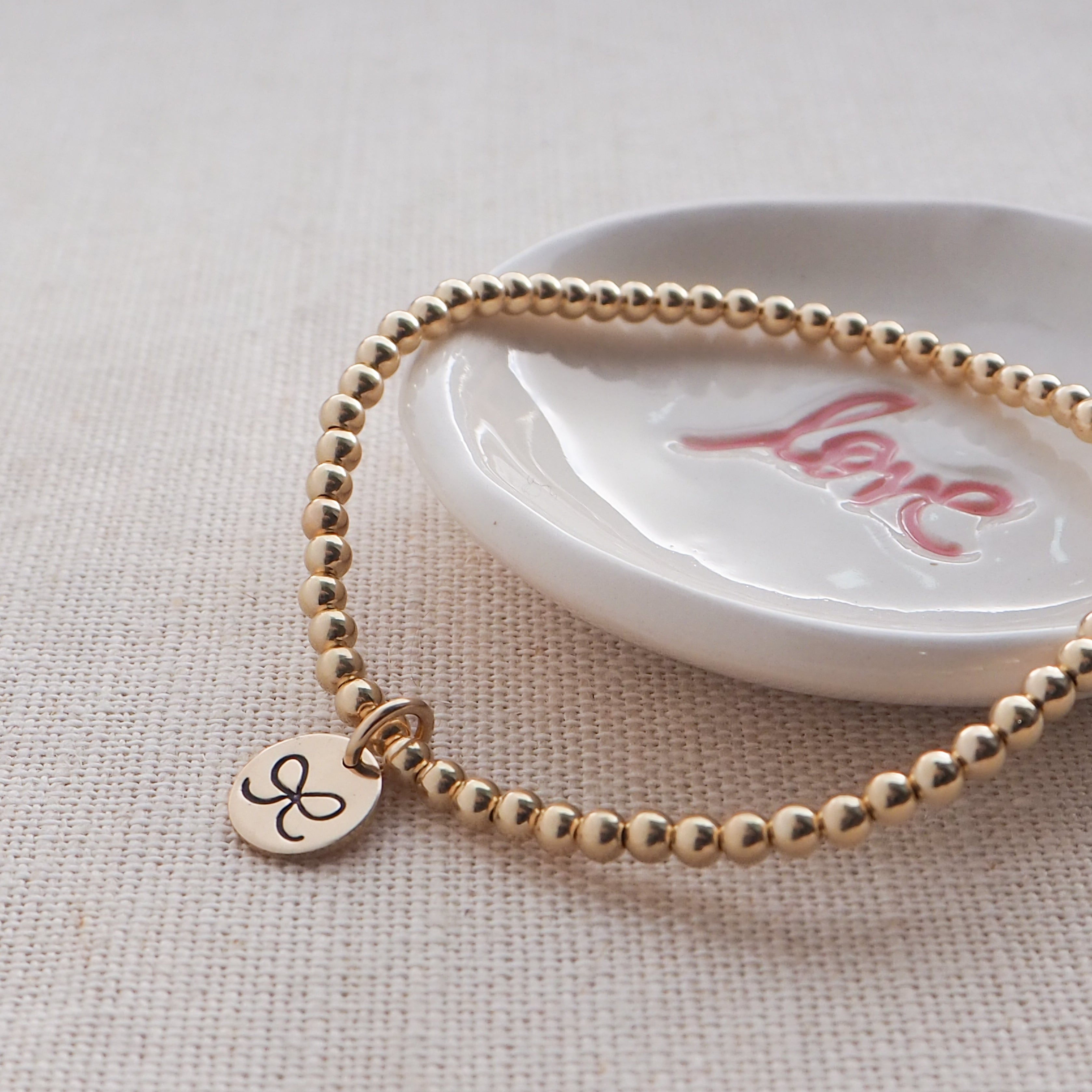 Gold Hand Stamped Bow Bracelet