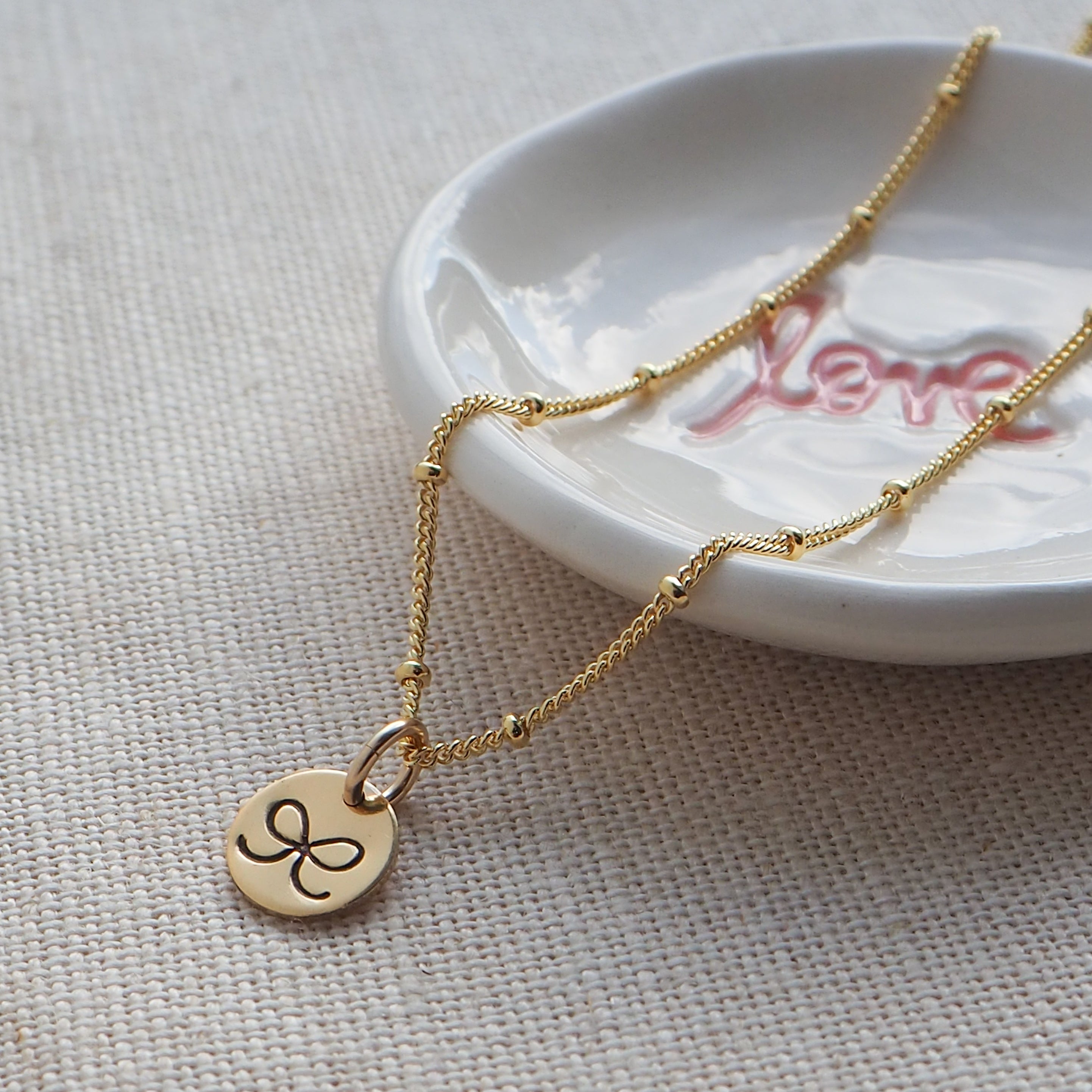 Gold Hand Stamped Bow Necklace