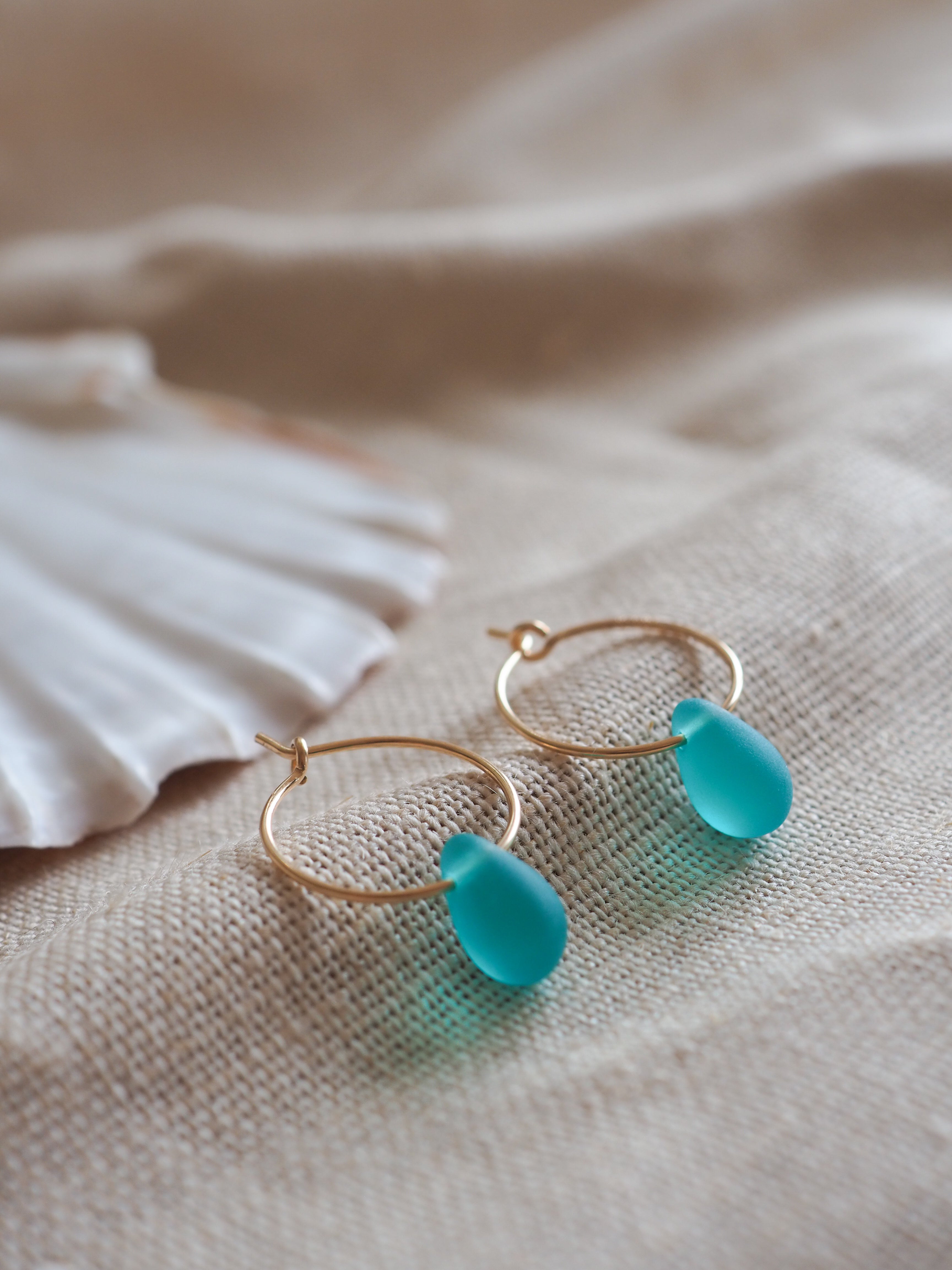 Gold drop of the ocean hoops