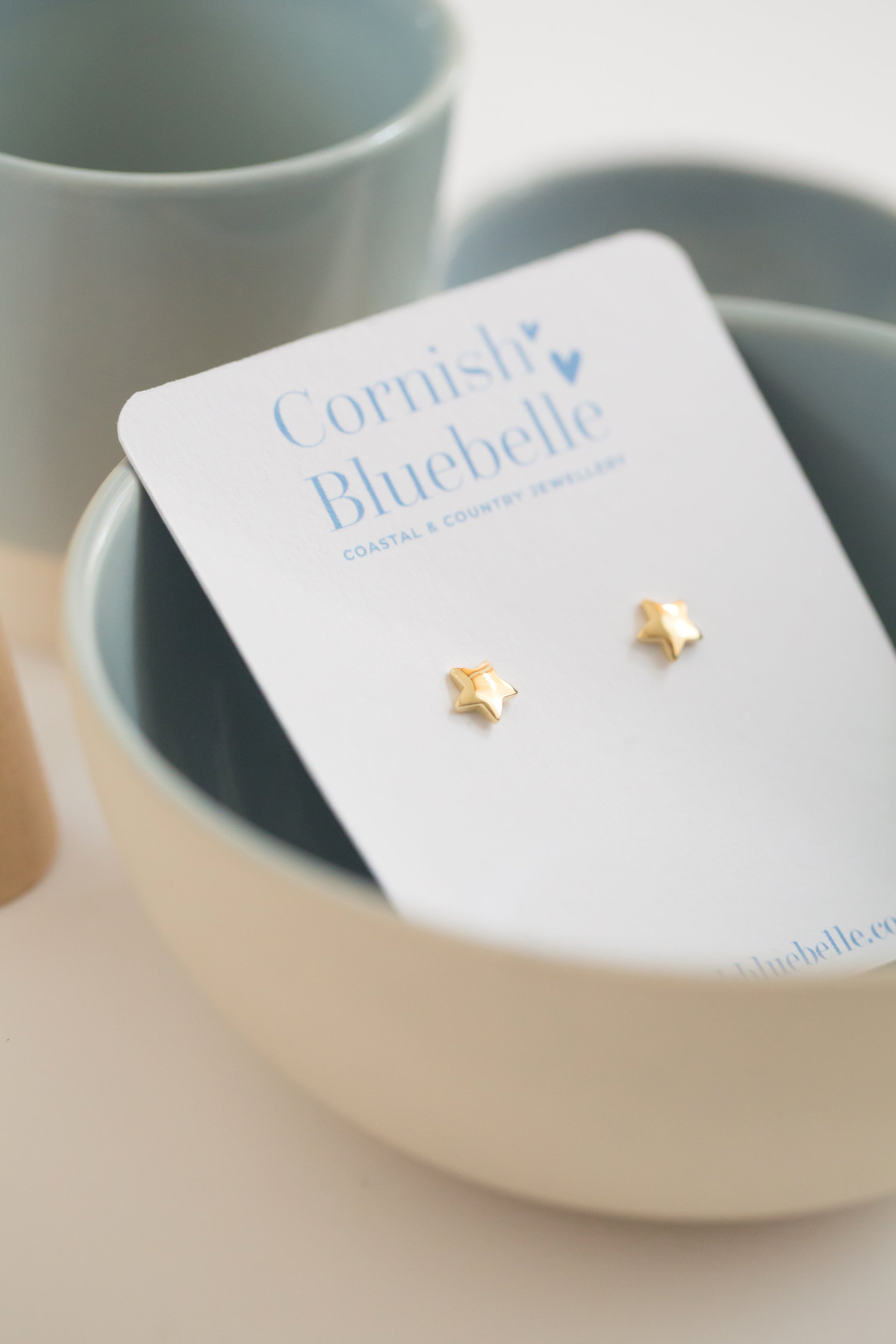 Gold star studs