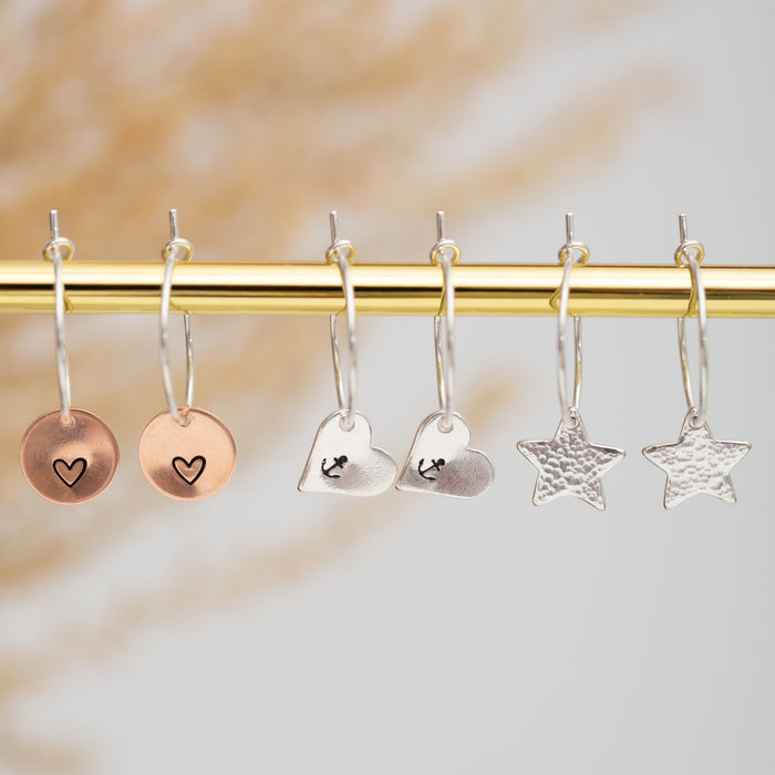 Silver stars hoop earrings