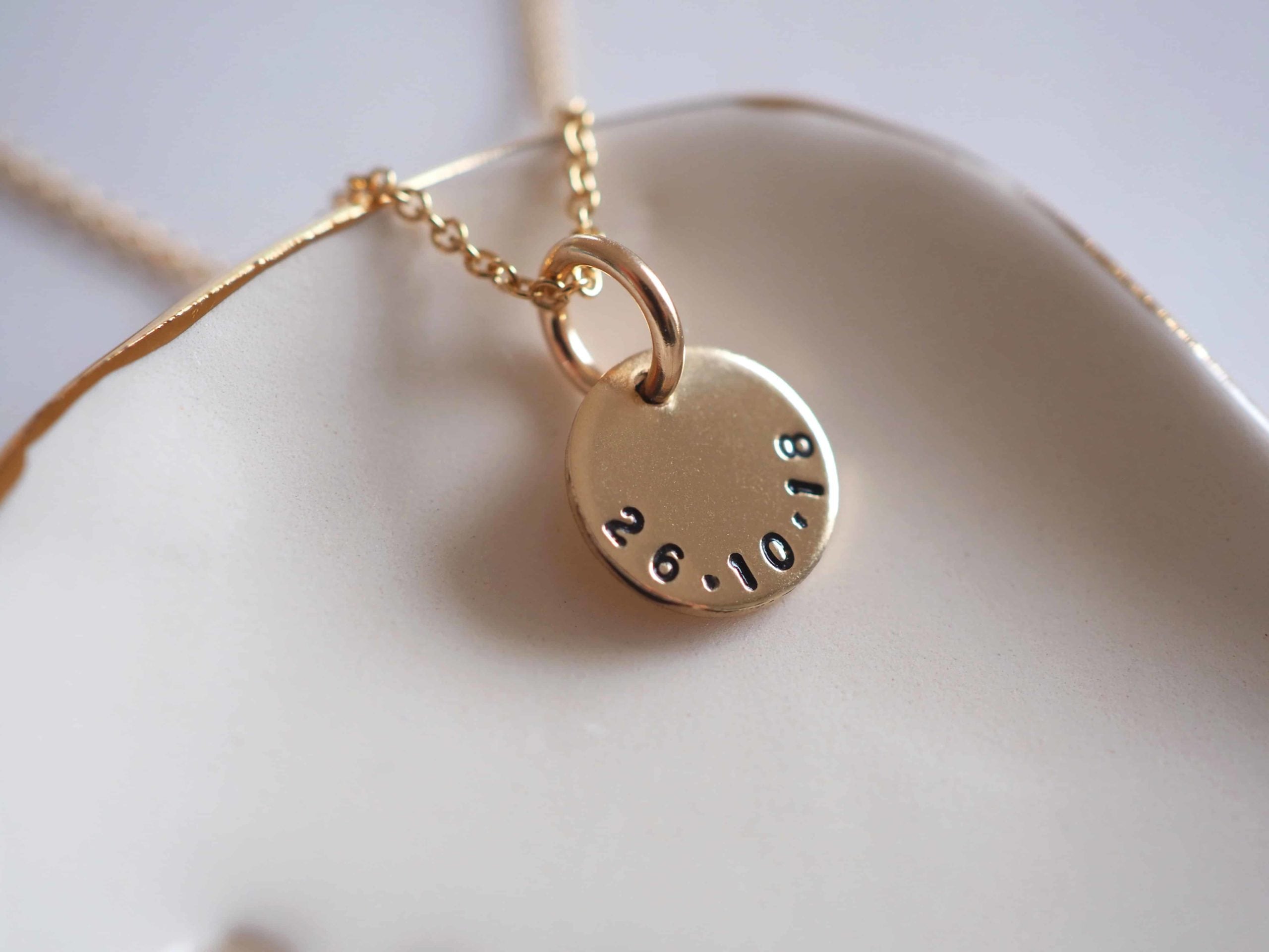 Gold mini disc necklace