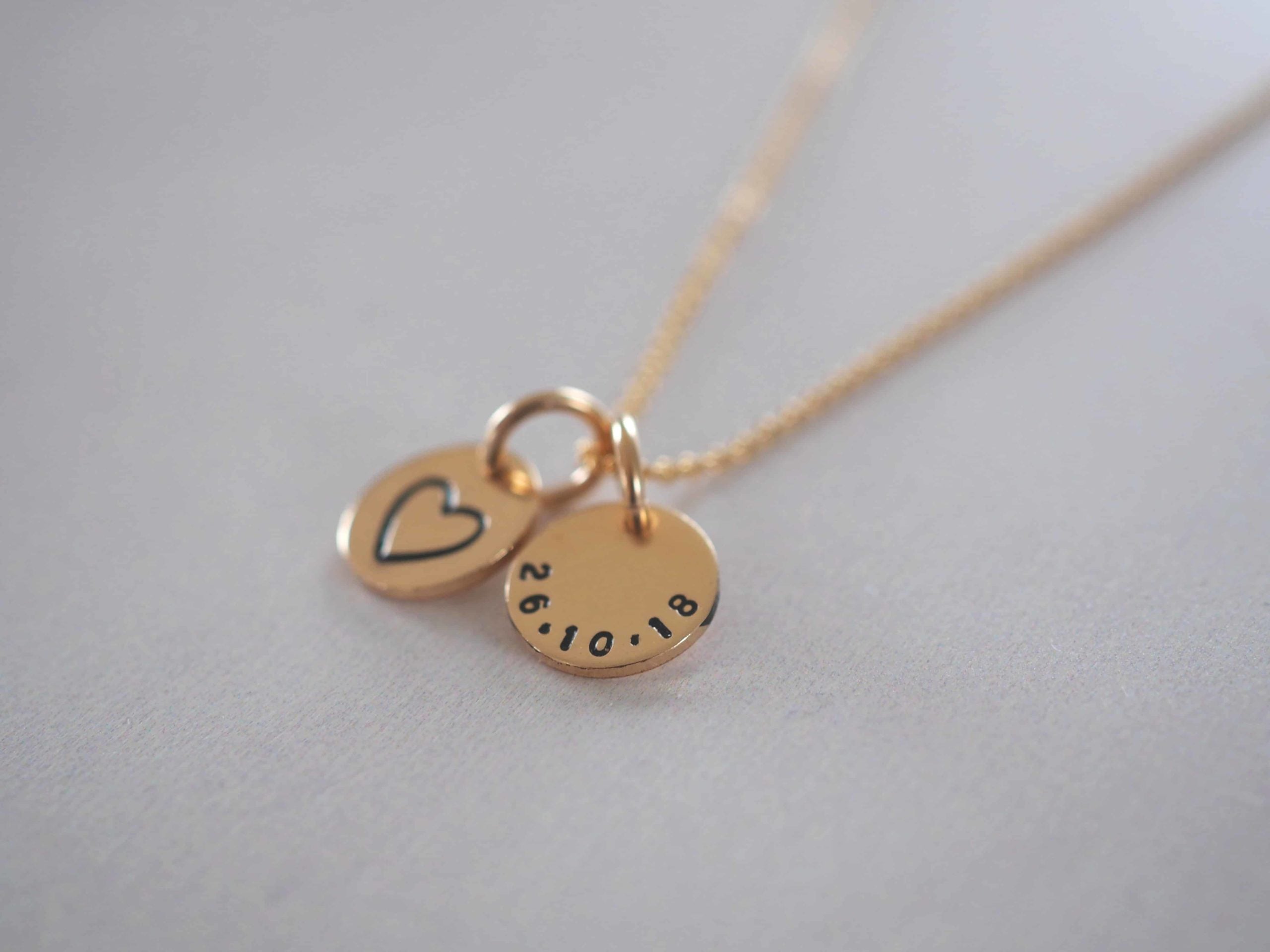 Gold mini disc necklace