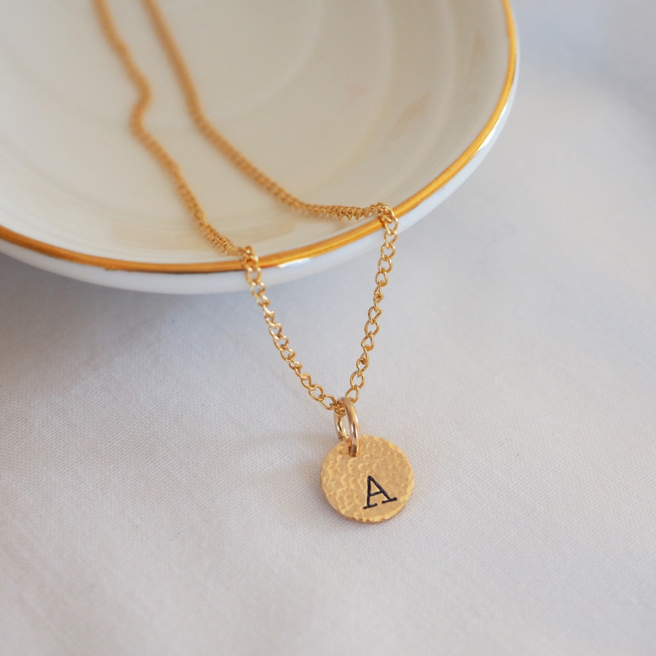 Hammered gold disc necklace