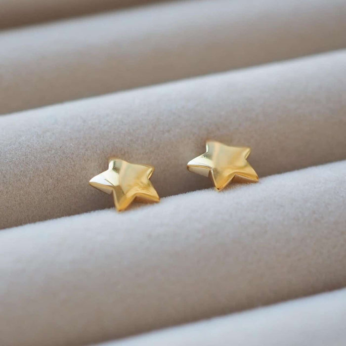 Gold star studs
