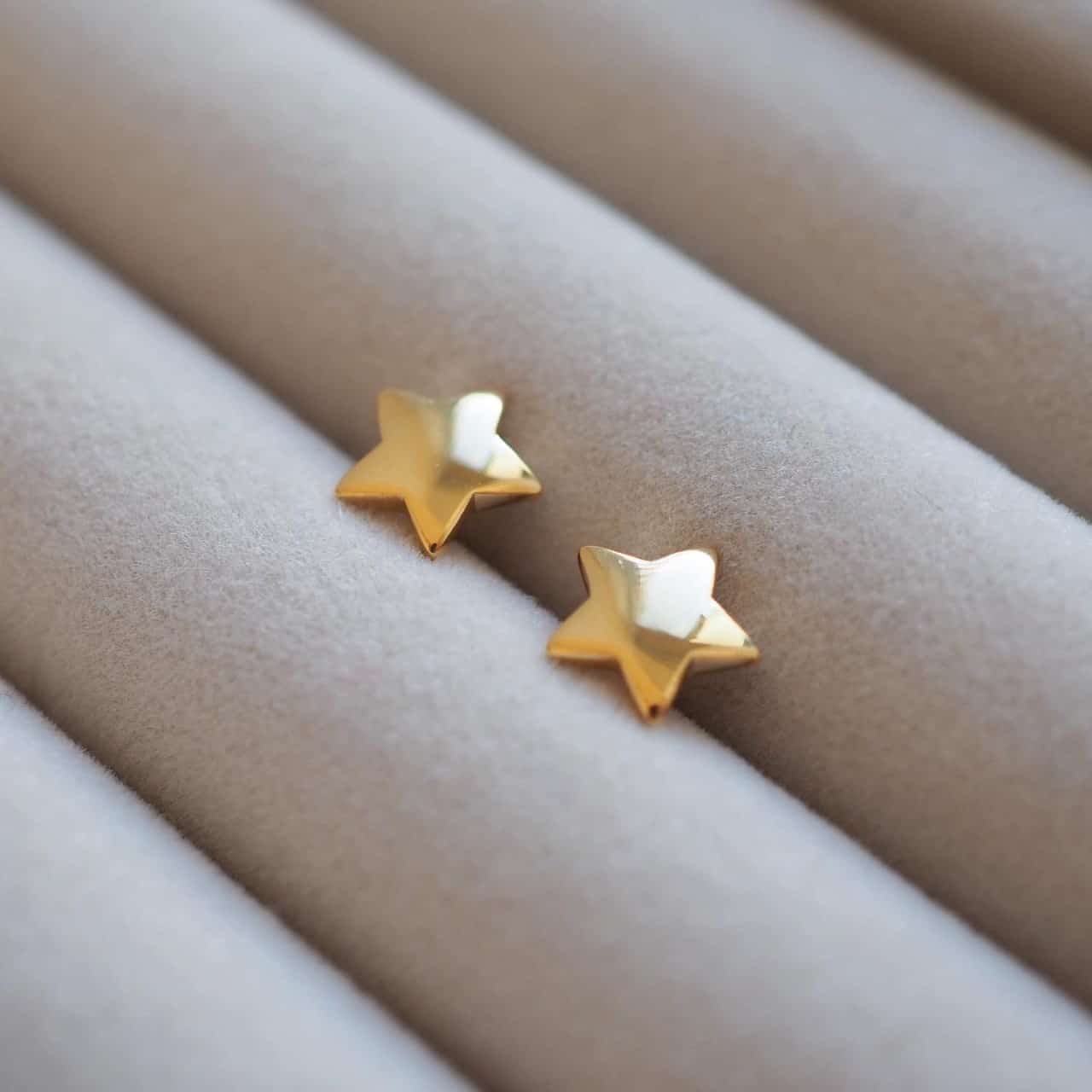 Gold star studs